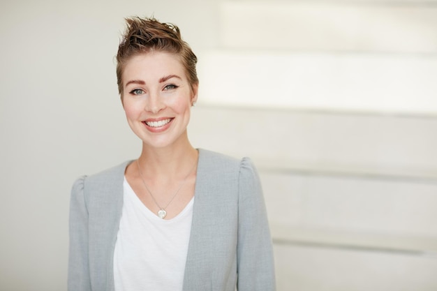 Ive taken all the right steps to success Portrait of a young businesswoman standing in an office