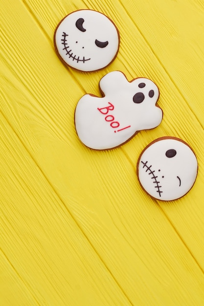 Jack skellington and ghost cookies gingerbread biscuits with icing for halloween holiday copy space ...