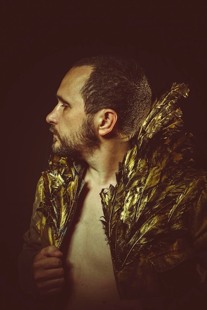 jacket attractive man with golden feathers