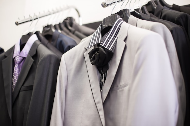 Jackets on hangers in Man clothing boutique