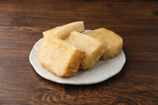 Jadah Goreng or Fried sticky rice cake is Javanese traditional cake made from glutinous rice