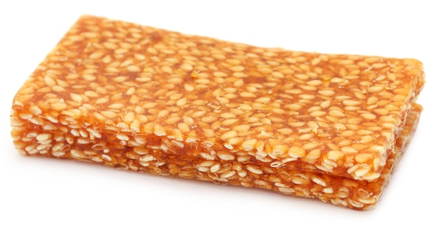 Jaggery sesame Candy over white background