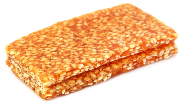 Jaggery sesame Candy over white background