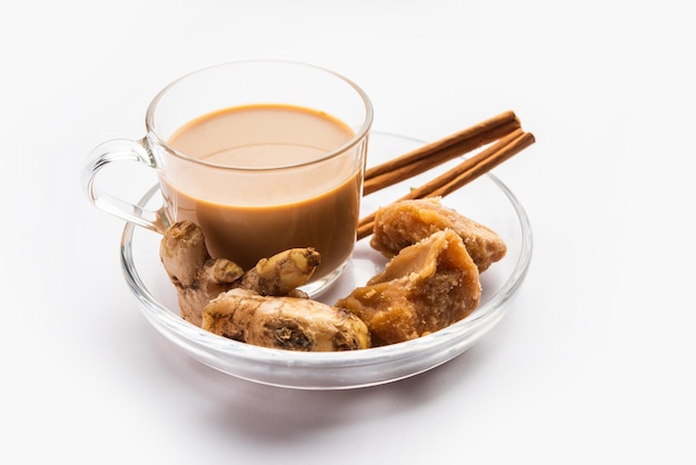 Jaggery tea or Gur ki chai with ingredients like gud ginger or adrak green cardamom and cinnamon