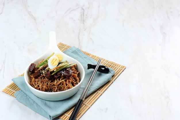 Jajangmyeon or JJajangmyeon  is Korean Noddle with Black Sauce Horizontal Picture