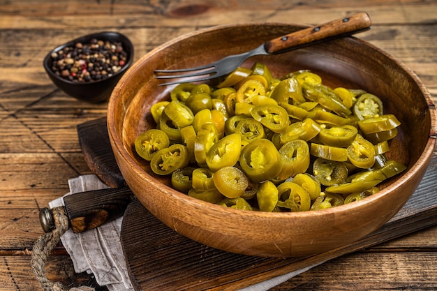 jalapenos-pickled-and-sliced-in-old-wood
