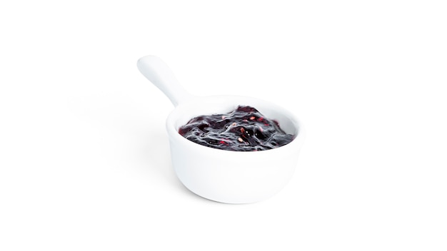 Jam in gravy boat isolated on a white background. High quality photo