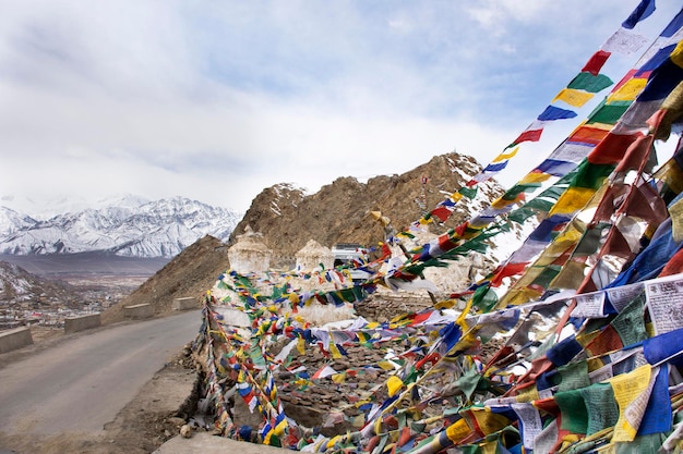 JAMMU KASHMIR INDIA MARCH 20 Indian and tibetan tied prayer and blessing flags on mount of Thiksey monastery and Namgyal Tsemo Gompa in Leh ladakh on March 21 2019 in Jammu and Kashmir India