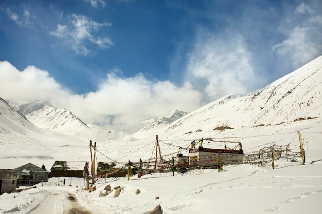 JAMMU KASHMIR INDIA MARCH 21 Indian and traveler people stop car rest at check point base camp on Khardung La Road in Himalaya mountain at Leh Ladakh on March 21 2019 in Jammu and Kashmir India