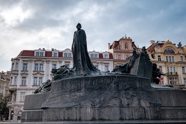 Jan Hus monument at Old Town Square is the heart of the Czech city of Prague with many churches, old houses, a town hall and Prague chimes