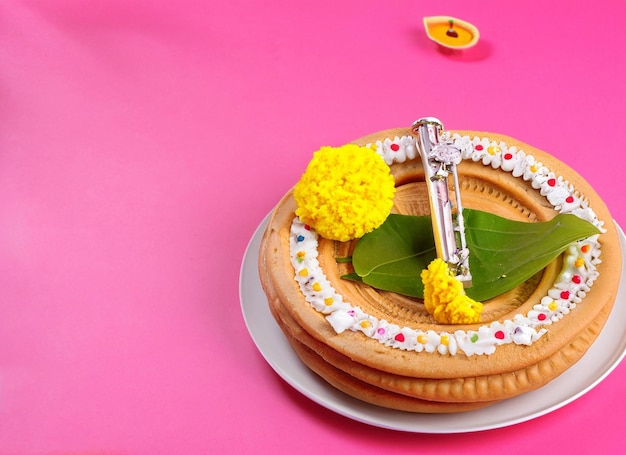 Janmasthmi celebration with sweets bright background