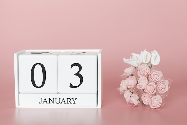 1月3日月の3日目モダンなピンクの背景のカレンダーキューブ