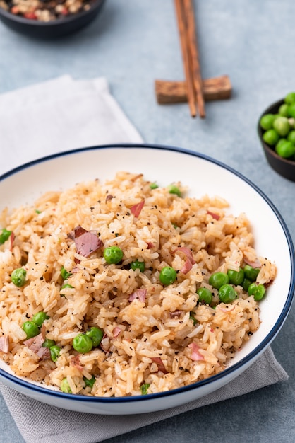 Japan fired rice with peas and chopstick