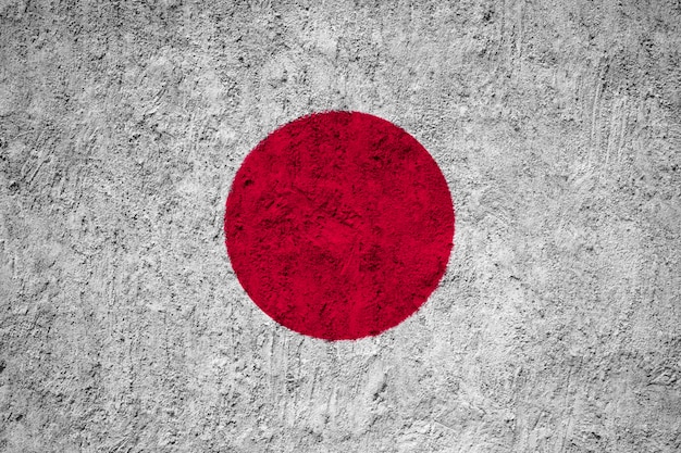 Japan flag painted on grunge wall