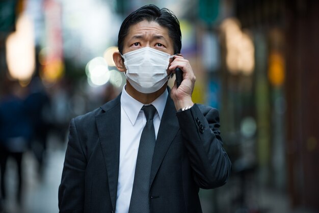 Japanese businessman in Tokyo with formal business suit