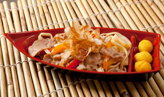 Japanese cuisine .box of fast food with with pork