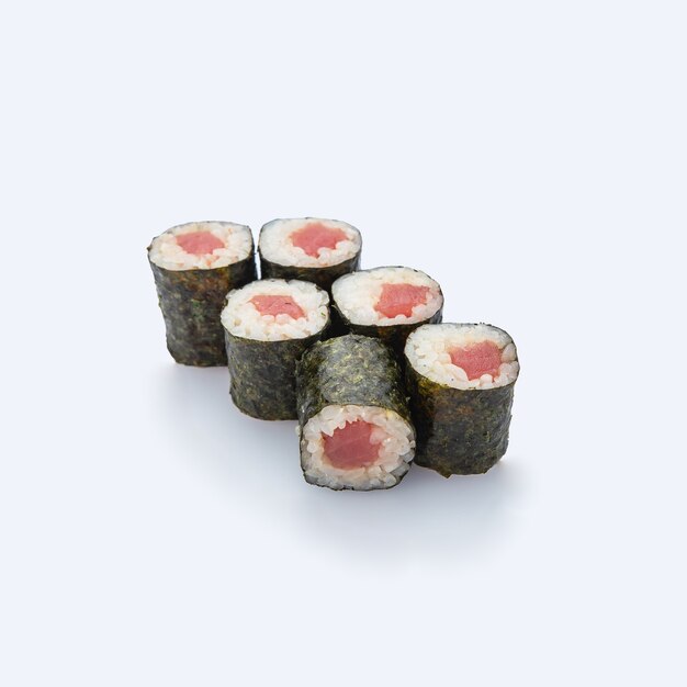 Japanese cuisine. Sushi roll on white background.