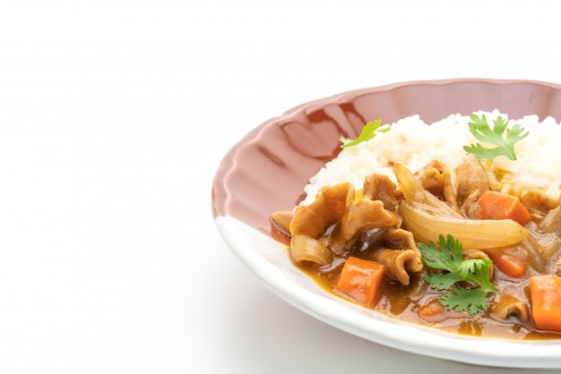 Japanese curry rice with sliced pork, carrot and onions