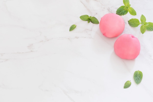 Japanese  dessert  mochi on white marble table