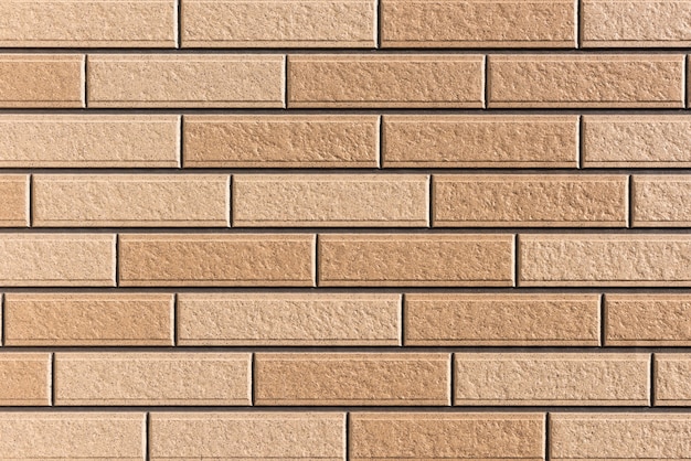 Japanese exterior wall cladding in a modern style lit with soft light. Imitates brick wall.