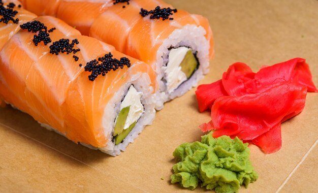 Japanese food concept Philadelphia sushi rolls Rolls in box to go