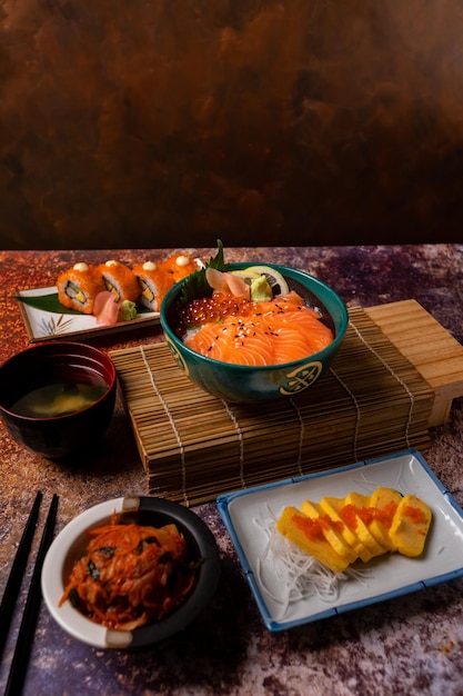 Japanese food set sushi rice salmon roe fish roe umami on a board table