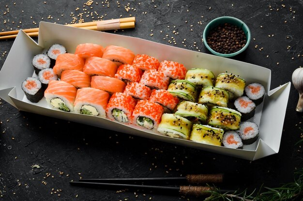 Japanese food set of sushi rolls with caviar fish and shrimp\
food delivery free space for text