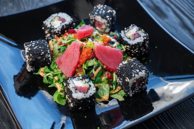 Japanese food sushi and rolls composition with tuna salad