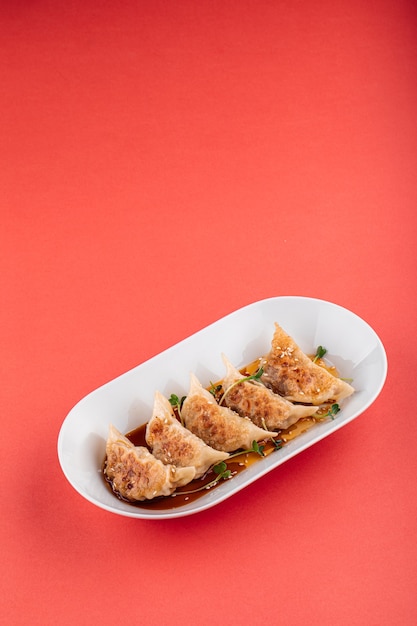 Japanese gedza dumplings with soy sauce  