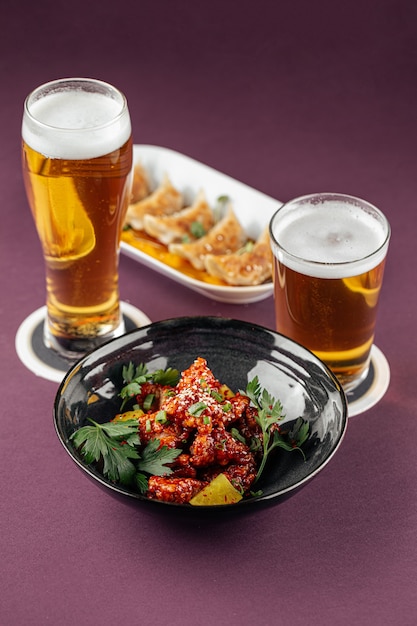 Japanese gedza and karaage chicken with beer