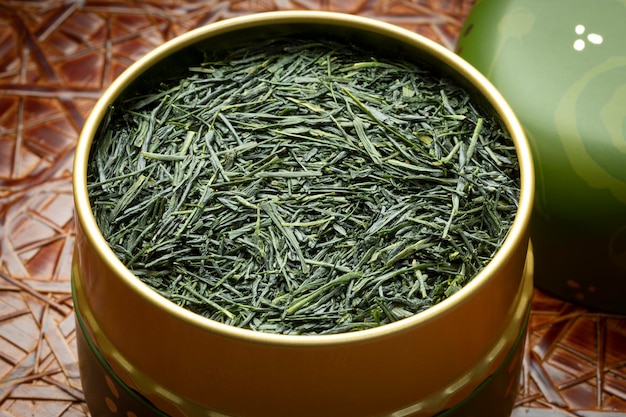 Japanese Gyokuro dried tea leaves close up in a tea tin