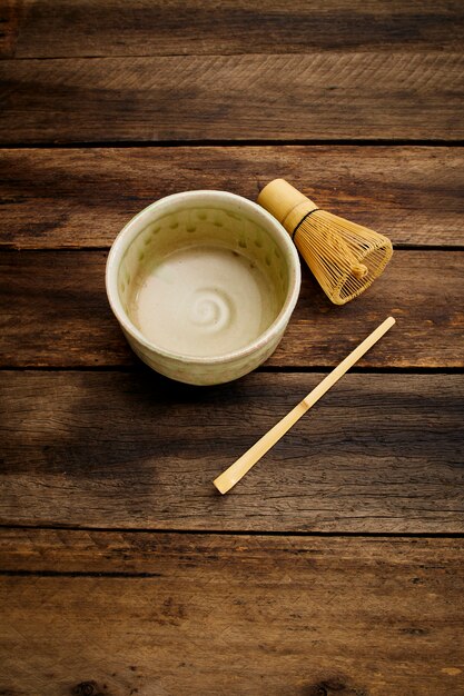 Japanese macha green tea on wood plank