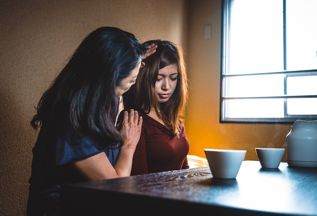 Japanese mom and daughter in a traditional apartment