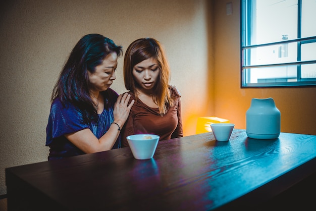 Japanese mom and daughter in a traditional apartment