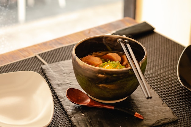 Japanese Ramen Soup With Chicken, Egg, Chives And Sprout at restaurant