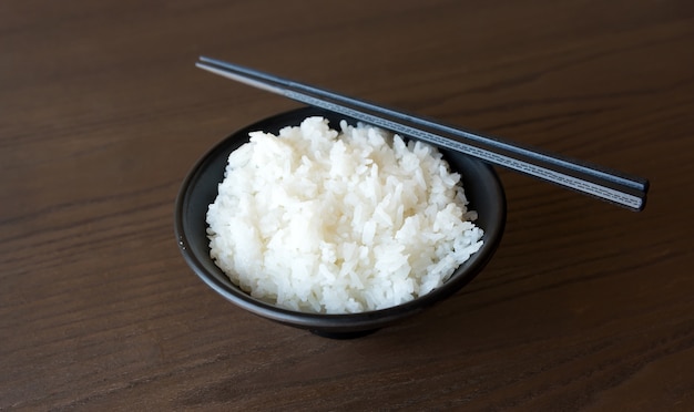 Japanese rice on wooden background