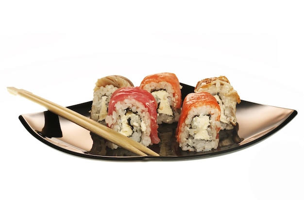 Japanese rolls on black plate