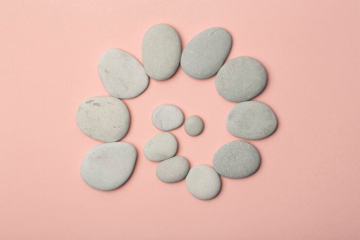 Japanese stones (stone towers) for spa, meditation and relaxation on pink