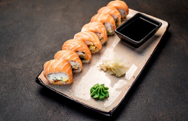 japanese sushi rolls on a stone background