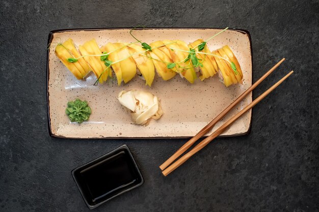 japanese sushi rolls on a stone background