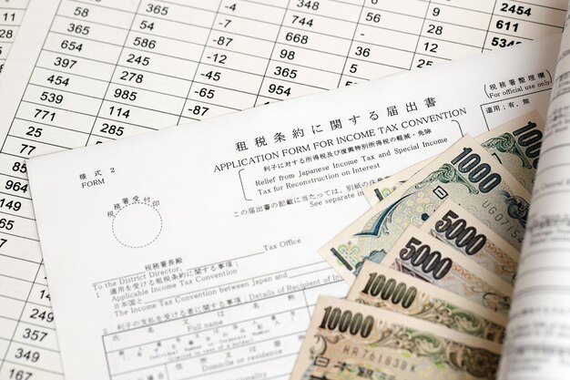 Photo japanese tax form relief from japanese income tax and special tax for reconstruction on interest