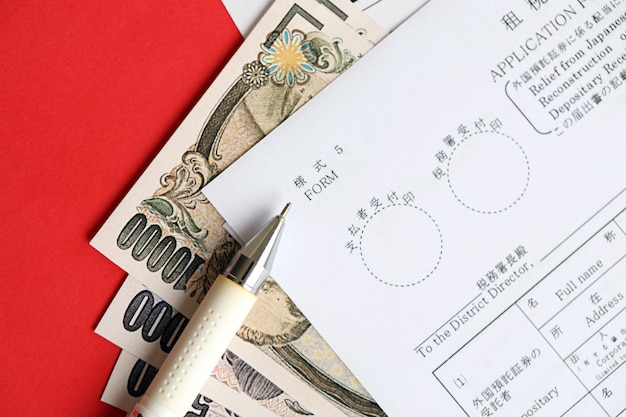 Photo japanese tax form relief of japanese income tax and special tax for reconstruction on dividends