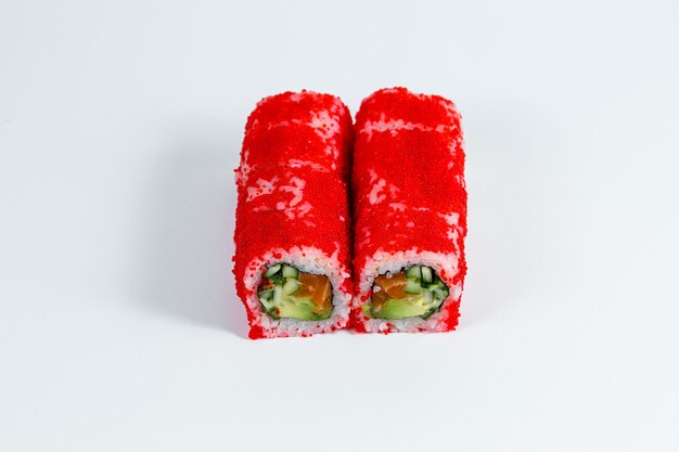 Japanese traditional food. Sushi rolls with fresh avocado caviar and cream cheese