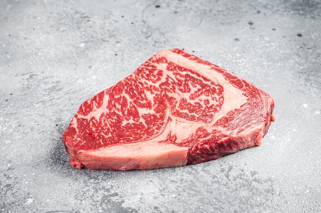 Japanese wagyu rib eye beef meat steak Gray background Top view