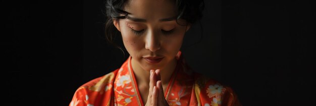 Premium Photo Japanese woman prays to god on black studio background