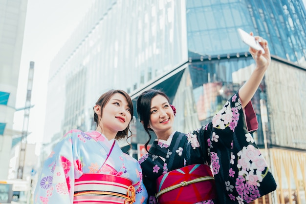 Japanese women with kimono walking in Tokyo