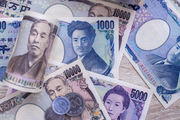 Japanese yen notes and Japanese yen coins for money concept background