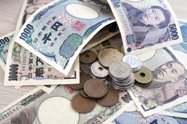 Japanese yen notes and japanese yen coins for money\
concept