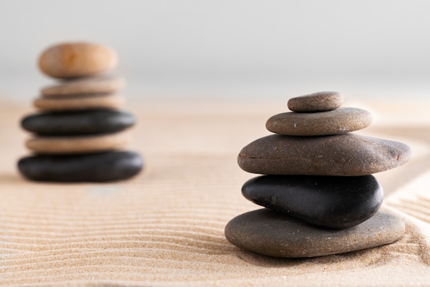 Japanese zen garden with stone in raked sand