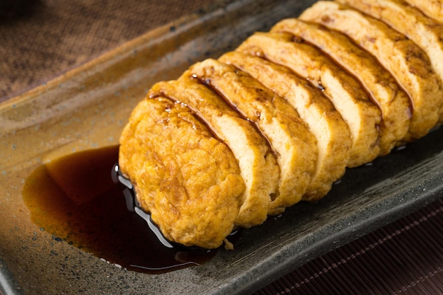 Japanse specialiteit straatvoedsel Tamagoyaki